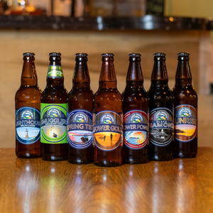 A selection of bottles of different Gower Brewery beers and cider